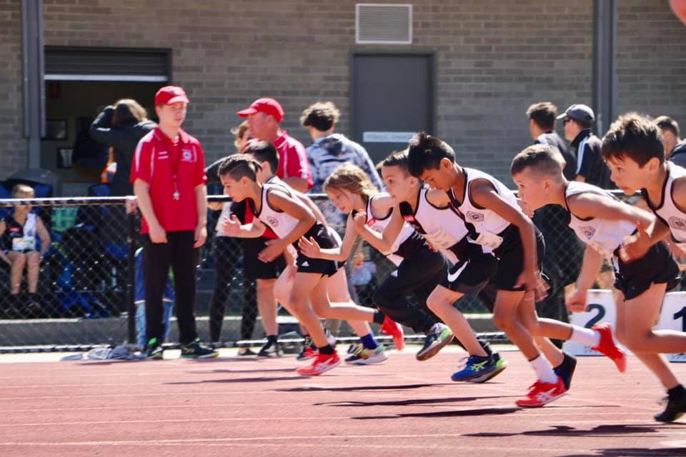 photo of young kids at the starting line of a running race