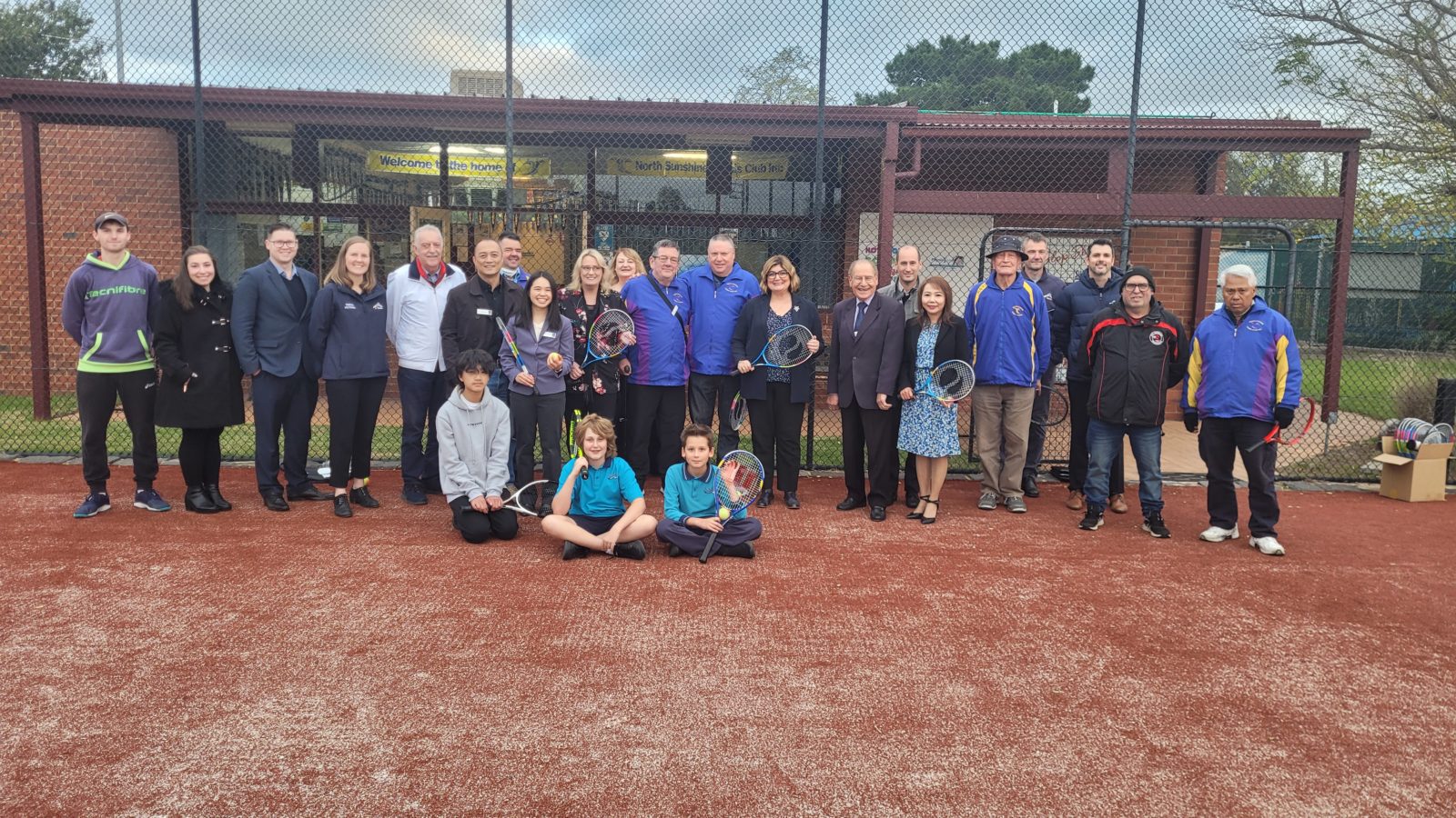Minister for Community Sport Ros Spence, Brimbank Mayor Cr Jasmine Nguyen and club members at Dempster Park Tennis.