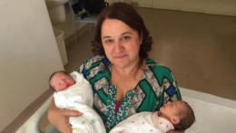 Senada holding twin newborn babies